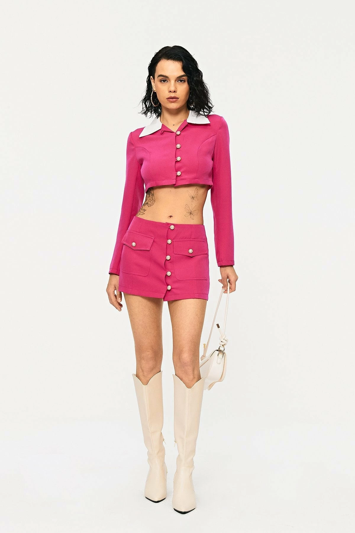 SOLADO Low Waist Button Front Pocket Patched Mini Skirt 4 SOLADO Low Waist Button Front Pocket Patched Mini Skirt - Image 4