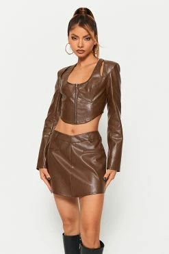 SOLADO Cut Out Curved Hem Crop Top & PU Leather Skirt Set