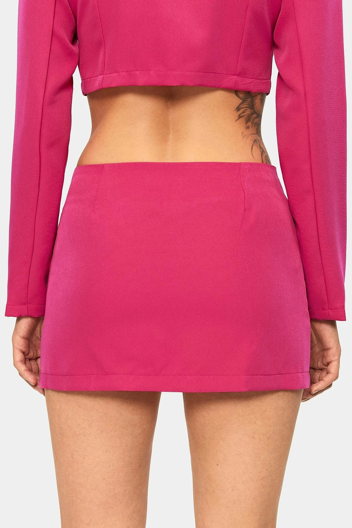 SOLADO Low Waist Button Front Pocket Patched Mini Skirt 7 SOLADO Low Waist Button Front Pocket Patched Mini Skirt - Image 7