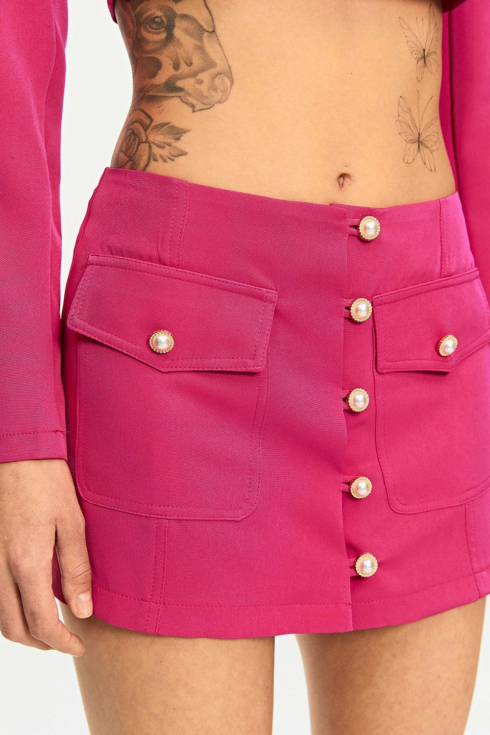 SOLADO Low Waist Button Front Pocket Patched Mini Skirt 5 SOLADO Low Waist Button Front Pocket Patched Mini Skirt - Image 5