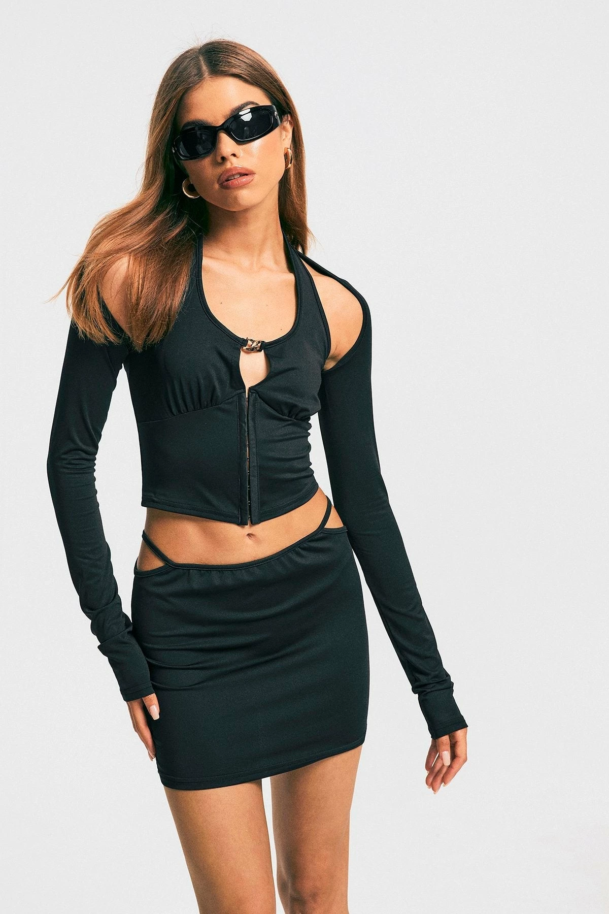 Solado Keyhole Backless Long Sleeve Top & Cut Out Mini Skirt Set 1 Solado Keyhole Backless Long Sleeve Top & Cut Out Mini Skirt Set
