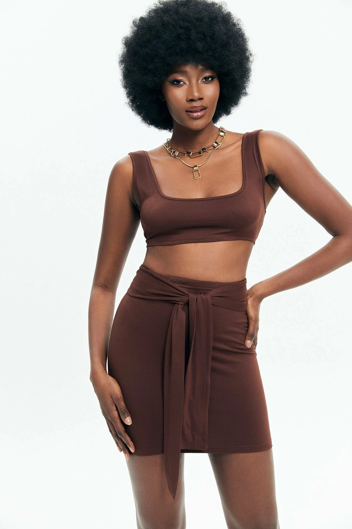 Solado Solid Backless Crop Top & High Waist Knot Skirt Set 1 Solado Solid Backless Crop Top & High Waist Knot Skirt Set