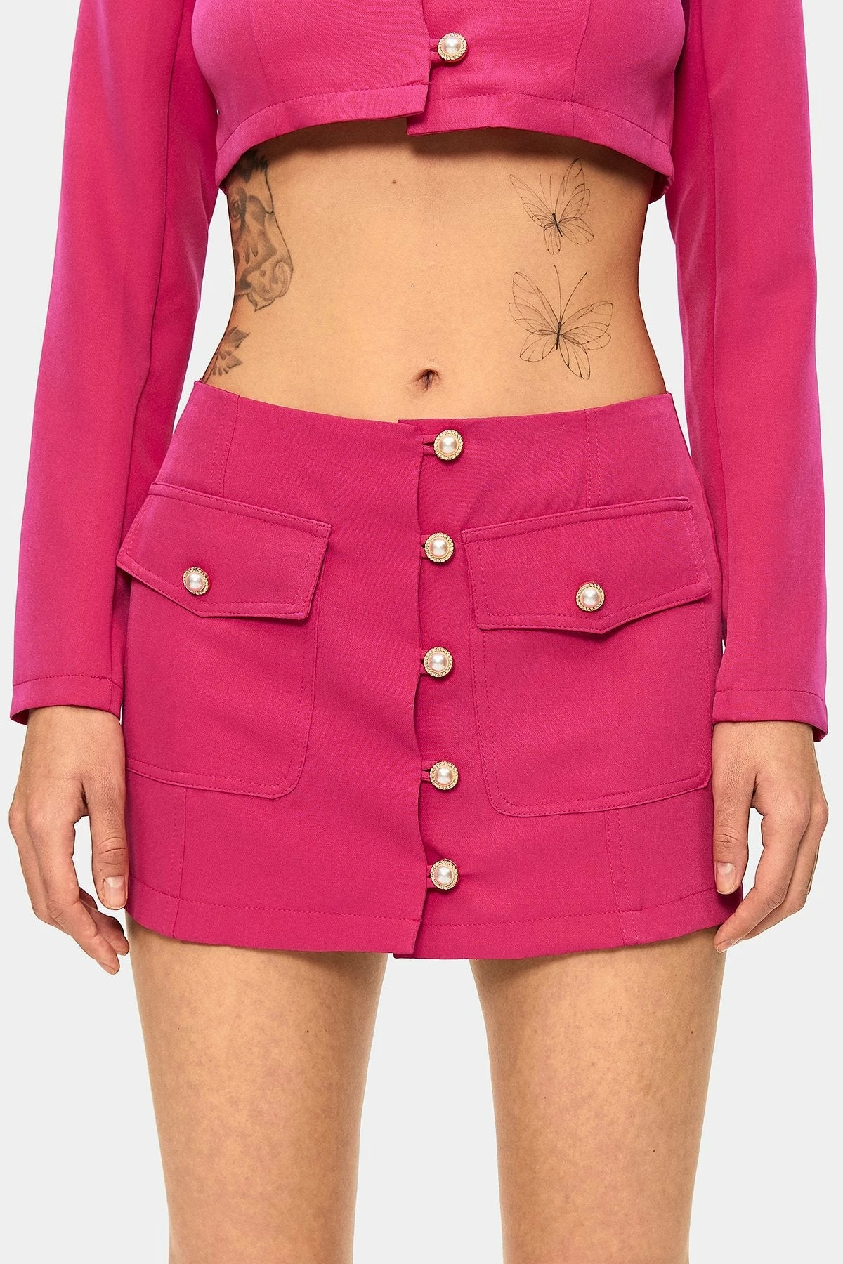 SOLADO Low Waist Button Front Pocket Patched Mini Skirt 6 SOLADO Low Waist Button Front Pocket Patched Mini Skirt - Image 6