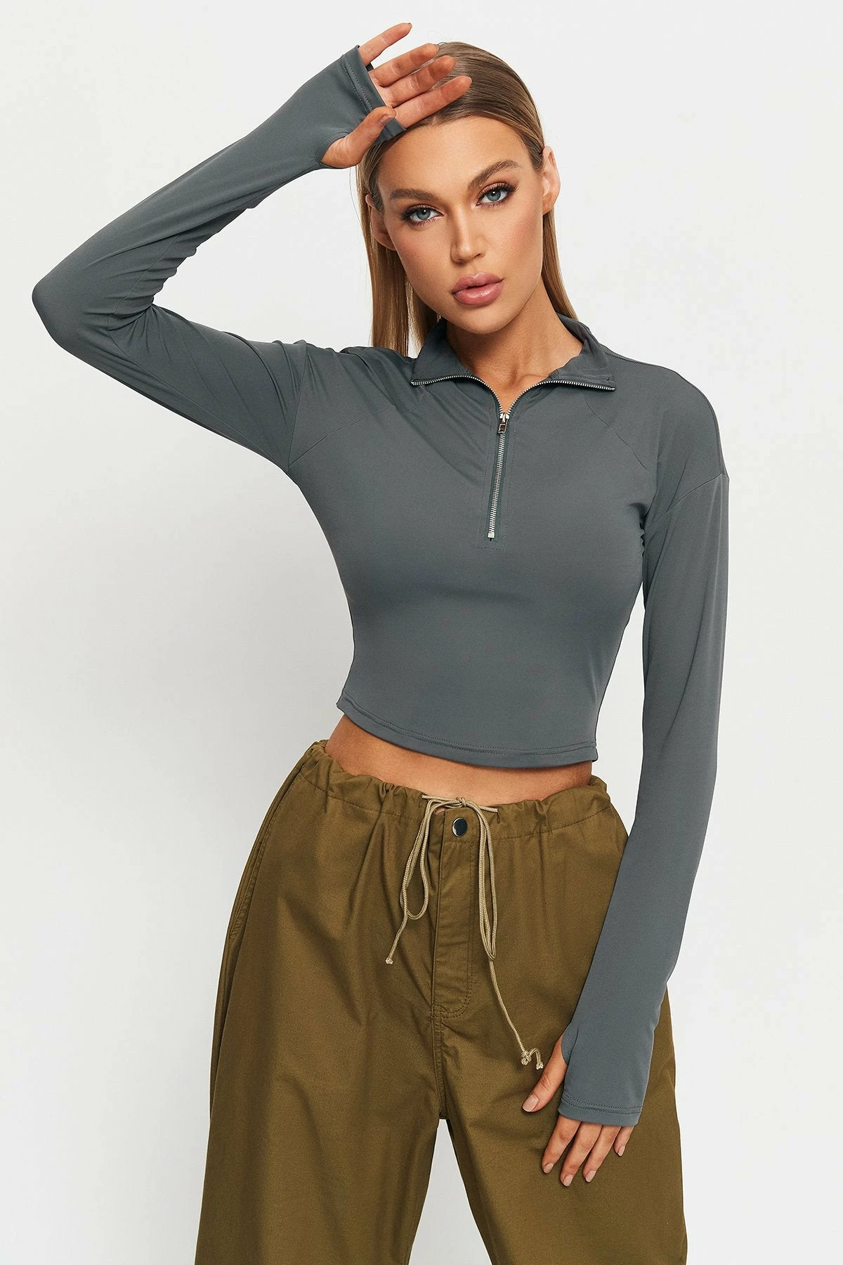 SOLADO Half Zipper Thumb Hole Long Sleeve Crop Top 1 SOLADO Half Zipper Thumb Hole Long Sleeve Crop Top