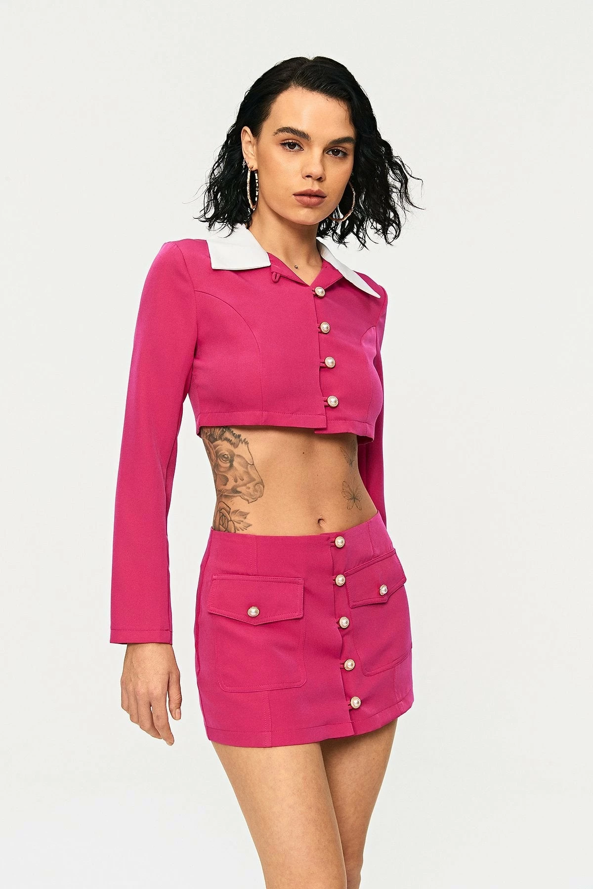 SOLADO Low Waist Button Front Pocket Patched Mini Skirt 3 SOLADO Low Waist Button Front Pocket Patched Mini Skirt - Image 3