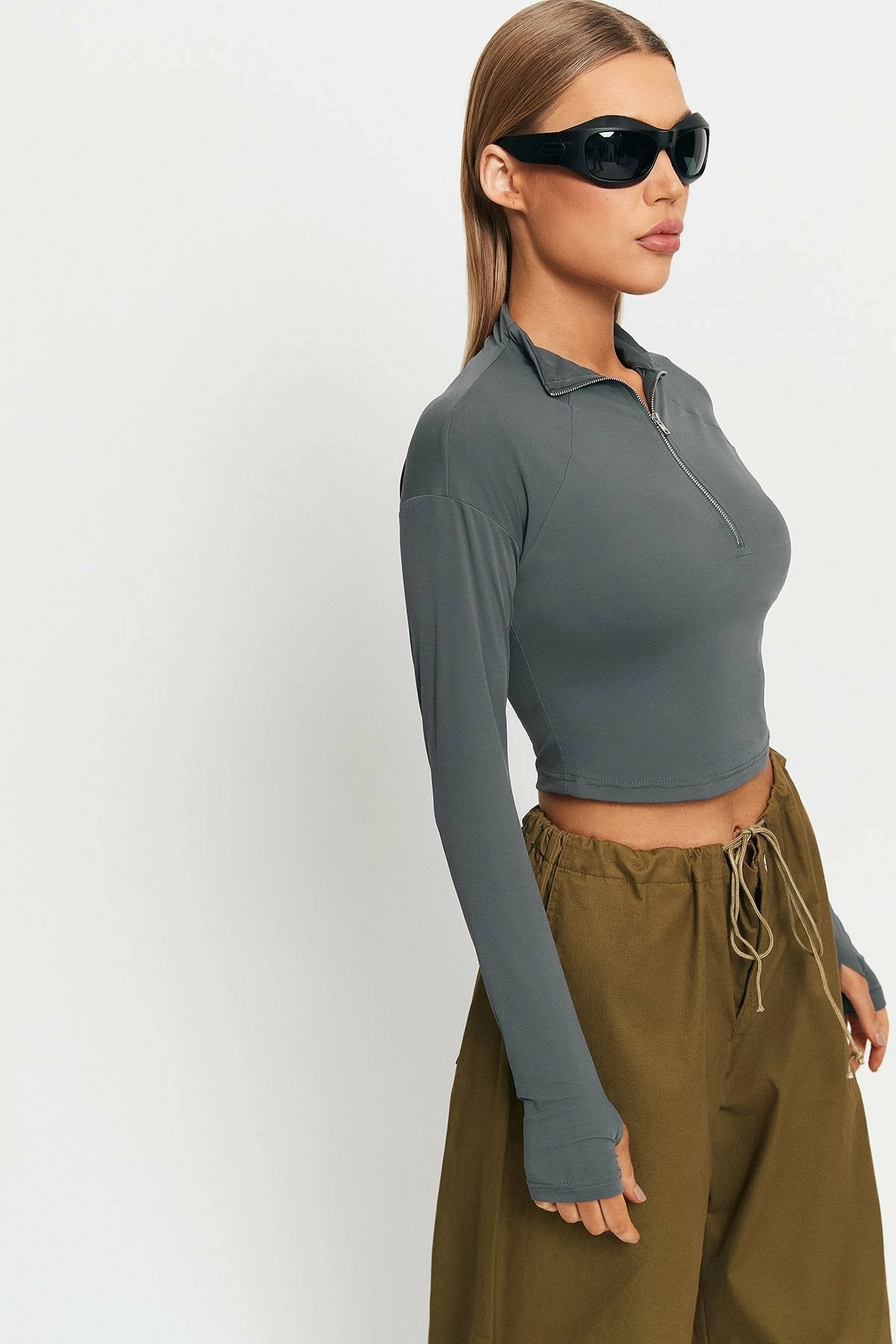 SOLADO Half Zipper Thumb Hole Long Sleeve Crop Top 3 SOLADO Half Zipper Thumb Hole Long Sleeve Crop Top - Image 3